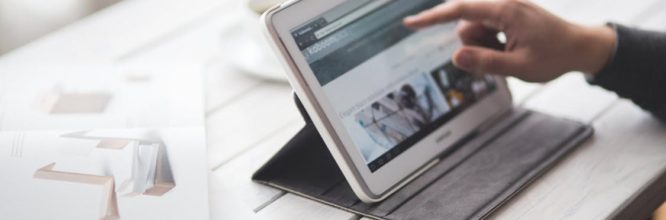 training tenders man pointing at tablet pc